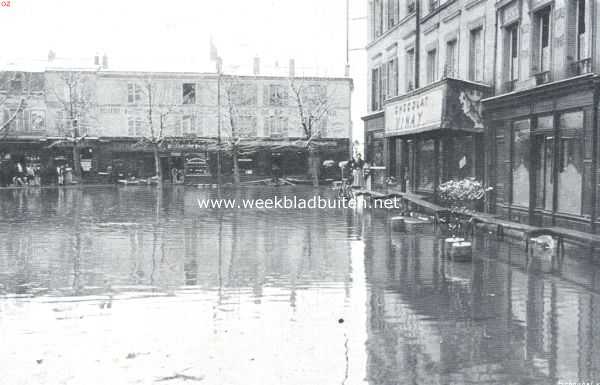 Bezons, een stadje aan de Seine, geheel overstroomd. De Marktplaats