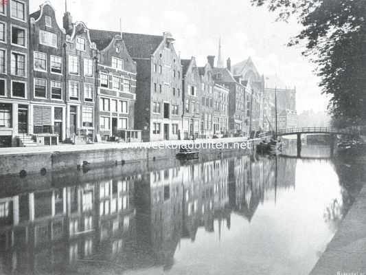 Noord-Holland, 1911, Amsterdam, De Nieuwezijds Voorburgwal. Ongedempte Nieuwezijds Voorburgwal bij de Geertruidensteeg