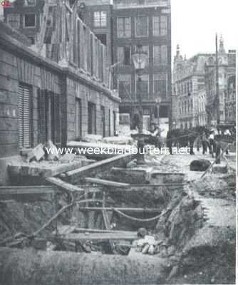 Noord-Holland, 1912, Amsterdam, Aen d'Amstel en aen 't Y, daer doet sich heerlijck ope .! Afbraak v.h. Commandantshuis en rioleering van de Dam