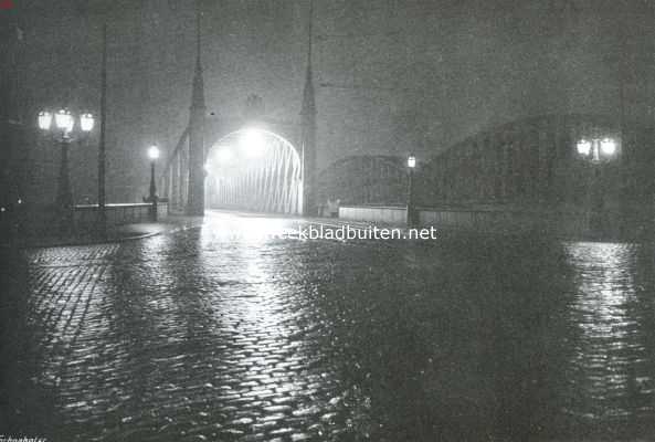 Over regen. Bij de Maasbrug te Rotterdam in den regenavond