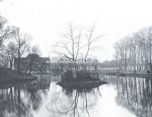Noord-Holland, 1919, Alkmaar, Alkmaar. Kennemersingel bij Geesterbrug in den winter. Op den achtergrond links het Gerechtsgebouw, rechts de Geesterhout. Het eilandje is thans verdwenen