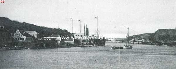 Curaao, 1920, Willemstad, Dagelijksche dingen van Curaao. De St. Annabaai. Op den achtergrond een tank van de Petroleum-maatschappij
