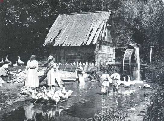 Kroatische boerinnen bij een ouden molen in de omgeving van Zagreb