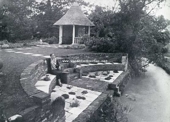 Noord-Holland, 1930, Oud-Loosdrecht, De tuin van Huize Buitenlust te Oud-Loosdrecht. Huize Buitenlust. De bank bij de moerasplanten en den koepel