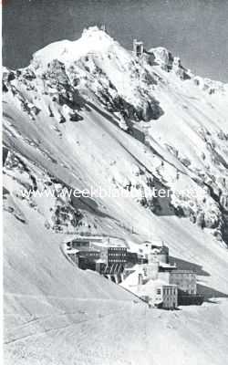 Duitsland, 1934, Onbekend, Garmisch-Partenkirchen in den winter. Het hotel Schneefernerhaus op de Zugspitze met kabelbaan naar den top. Op den top links het Mnchenerhaus, op den voorgrond een deel van het Schneefernerplatt, een dorado voor skirs